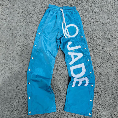 acheter Pantalons de survêtement en nylon pour hommes avec taille élastique et imprimé réfléchissant online manufacture