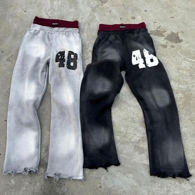 Homme personnalisé Vêtements de rue en détresse lavage à l'acide Pantalons de sueur élargis Hommes sac à dos Pantalons de sueur à double taille